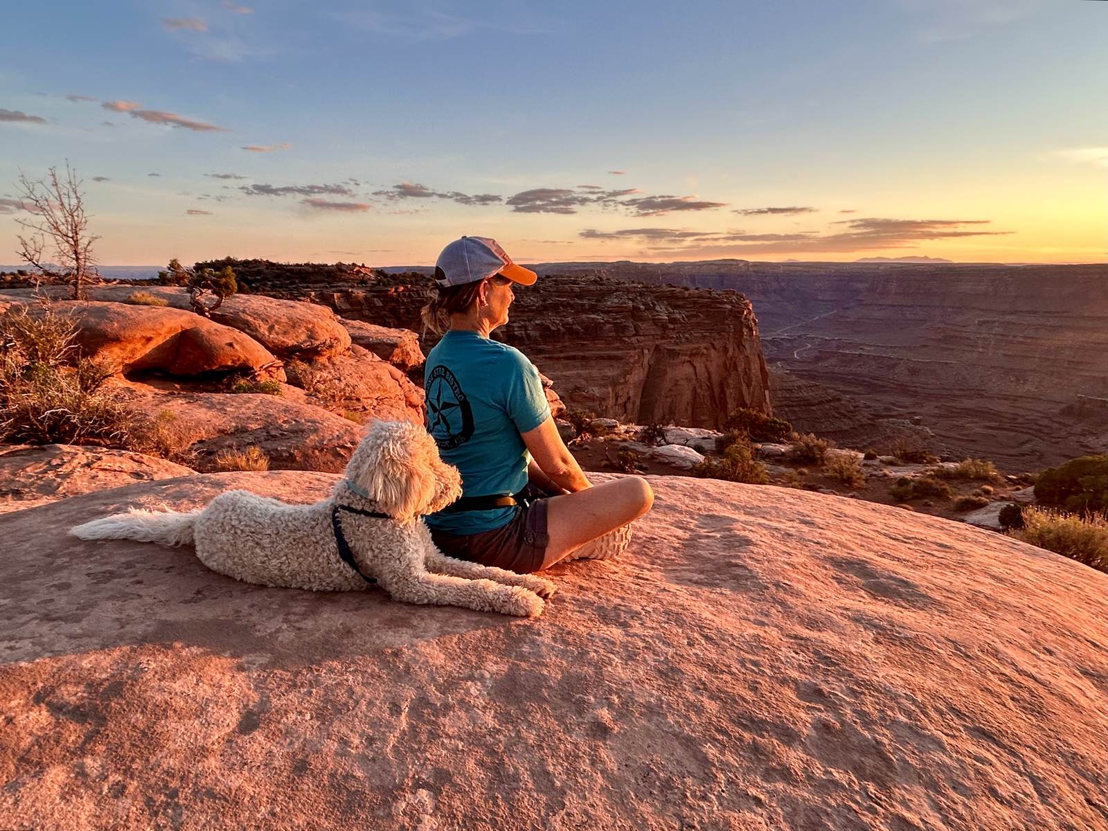 Julia and Rembrandt watching the sunrise from the rim at Dead Horse Point.